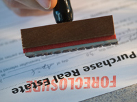 af500 foreclosure paperwork stamp 200 Foreclosures Plunge, but New States Now Suffer